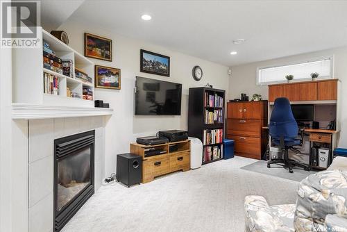 1526 Dewdney Bay, Regina, SK - Indoor With Fireplace