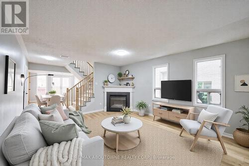 556 Delphine Drive, Burlington, ON - Indoor Photo Showing Living Room With Fireplace