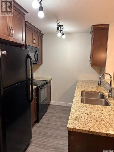 102 1220 Blackfoot Drive, Regina, SK - Indoor Photo Showing Kitchen With Double Sink