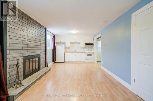 320 Highridge Avenue, Hamilton, ON - Indoor Photo Showing Kitchen With Fireplace