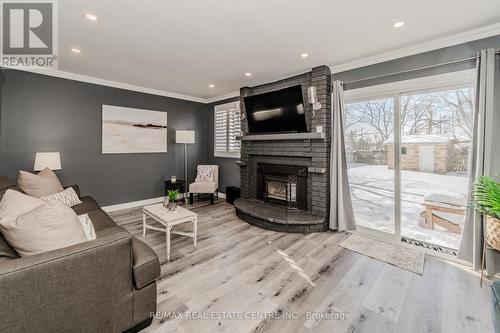 387 Cyrus Street, Cambridge, ON - Indoor Photo Showing Living Room With Fireplace