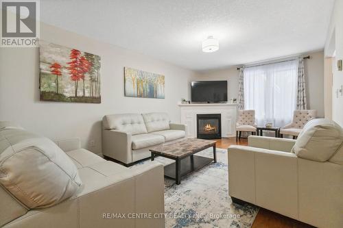 691 Clearwater Crescent, London, ON - Indoor Photo Showing Living Room With Fireplace