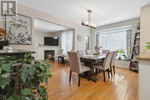 691 Clearwater Crescent, London, ON - Indoor Photo Showing Dining Room With Fireplace