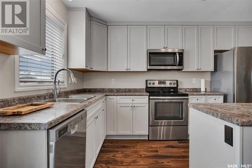 614 Kolynchuk Court, Saskatoon, SK - Indoor Photo Showing Kitchen With Stainless Steel Kitchen With Double Sink