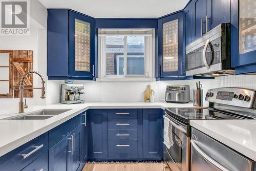 1034 Meredith Avenue, Mississauga, ON - Indoor Photo Showing Kitchen With Stainless Steel Kitchen With Double Sink