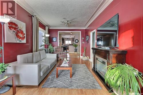 2164 Atkinson Street, Regina, SK - Indoor Photo Showing Living Room With Fireplace