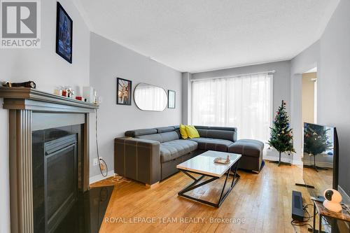 122 Kimberwick Crescent, Ottawa, ON - Indoor Photo Showing Living Room With Fireplace