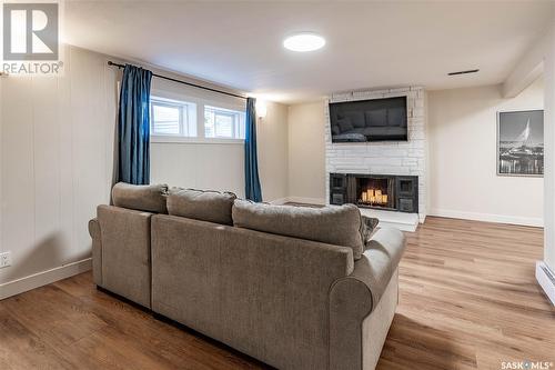 7 Bell Crescent, Saskatoon, SK - Indoor Photo Showing Living Room With Fireplace