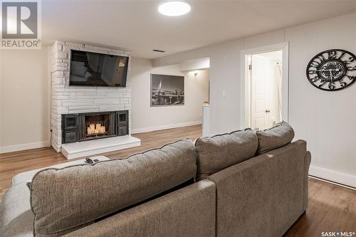 7 Bell Crescent, Saskatoon, SK - Indoor Photo Showing Living Room With Fireplace