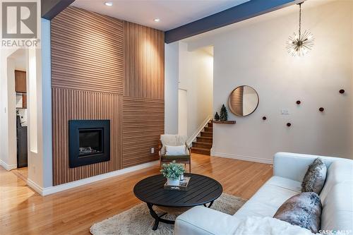 7 Bell Crescent, Saskatoon, SK - Indoor Photo Showing Living Room With Fireplace