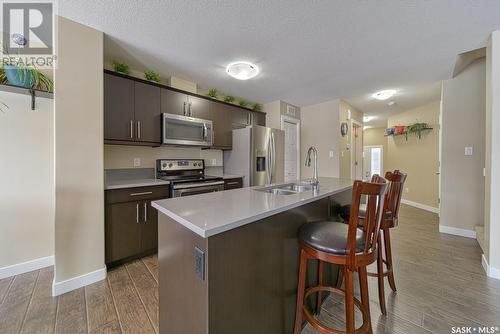 46 5301 Beacon Drive, Regina, SK - Indoor Photo Showing Kitchen With Stainless Steel Kitchen With Double Sink