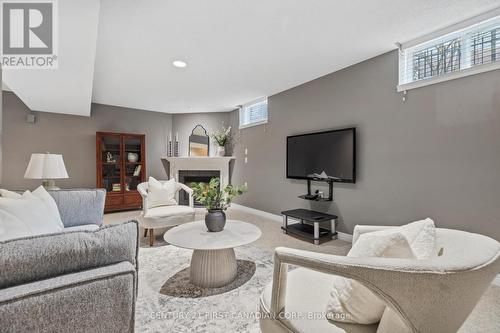 1685 Devos Drive, London, ON - Indoor Photo Showing Living Room With Fireplace