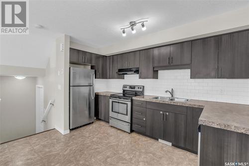 2-5294 Aerodrome Road, Regina, SK - Indoor Photo Showing Kitchen With Stainless Steel Kitchen With Double Sink