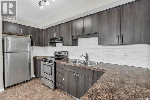 2-5294 Aerodrome Road, Regina, SK - Indoor Photo Showing Kitchen With Stainless Steel Kitchen With Double Sink