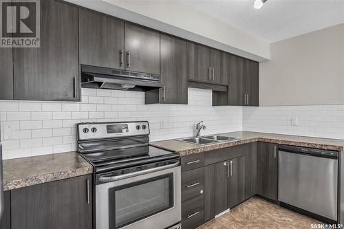 2-5294 Aerodrome Road, Regina, SK - Indoor Photo Showing Kitchen With Stainless Steel Kitchen With Double Sink