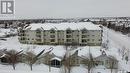 408 2909 Arens Road E, Regina, SK  - Outdoor With Balcony With Facade 