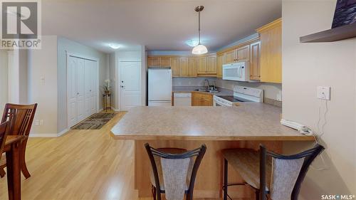 408 2909 Arens Road E, Regina, SK - Indoor Photo Showing Kitchen With Double Sink