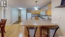 408 2909 Arens Road E, Regina, SK  - Indoor Photo Showing Kitchen With Double Sink 