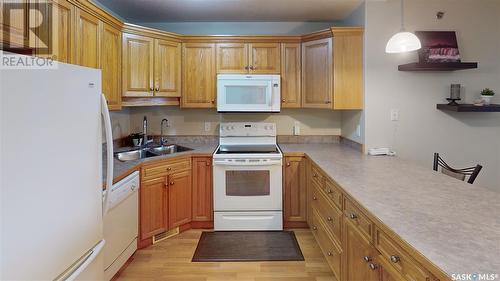 408 2909 Arens Road E, Regina, SK - Indoor Photo Showing Kitchen With Double Sink