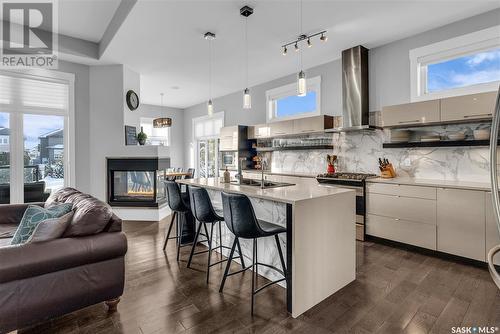 106 Werschner Crescent, Saskatoon, SK - Indoor Photo Showing Kitchen With Fireplace With Upgraded Kitchen