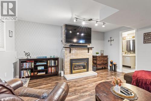 227 Saddy Avenue, London, ON - Indoor Photo Showing Living Room With Fireplace