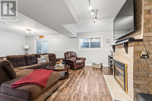 227 Saddy Avenue, London, ON - Indoor Photo Showing Living Room With Fireplace