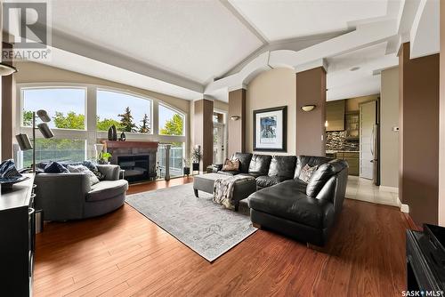 1361 Lapchuk Crescent N, Regina, SK - Indoor Photo Showing Living Room With Fireplace