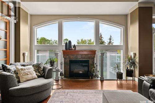 1361 Lapchuk Crescent N, Regina, SK - Indoor Photo Showing Living Room With Fireplace