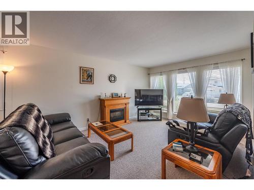 44 Bayview Crescent, Osoyoos, BC - Indoor Photo Showing Living Room With Fireplace