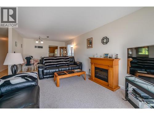 44 Bayview Crescent, Osoyoos, BC - Indoor Photo Showing Living Room With Fireplace