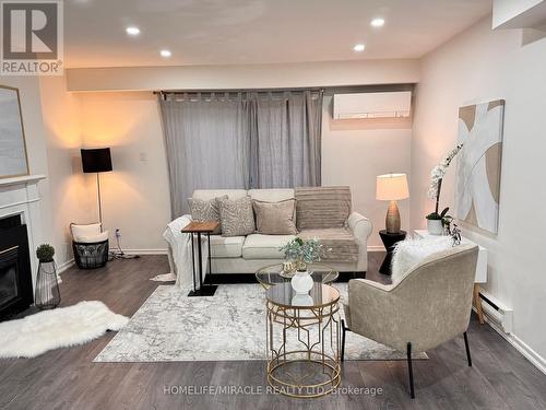 66 Arbour Glen Crescent, London, ON - Indoor Photo Showing Living Room With Fireplace