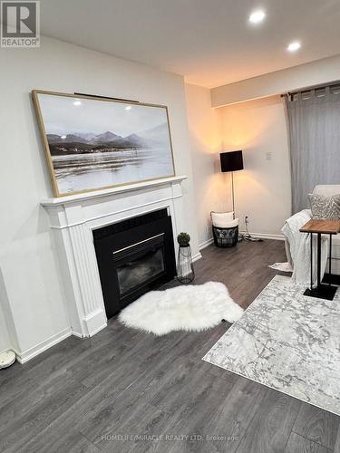 66 Arbour Glen Crescent, London, ON - Indoor Photo Showing Living Room With Fireplace