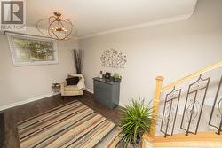 Huge foyer now with new vinyl plank flooring - 