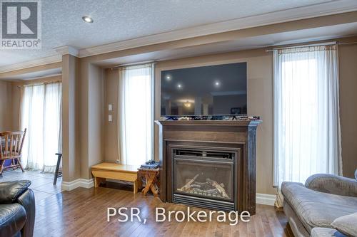 38 Huck Crescent, Kitchener, ON - Indoor Photo Showing Living Room With Fireplace