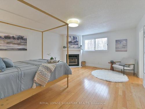 4107 Wheelwright Cres, Mississauga, ON - Indoor Photo Showing Bedroom With Fireplace