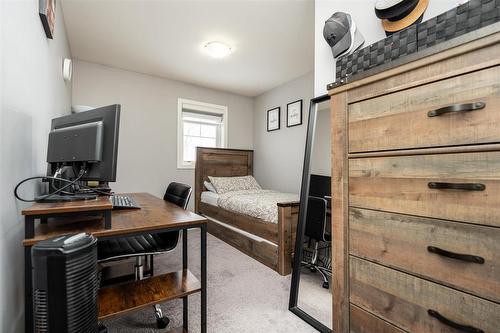 709 280 Amber Trail, Winnipeg, MB - Indoor Photo Showing Bedroom