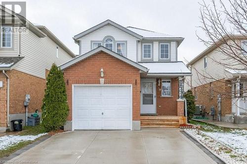 View of property featuring a garage - 39 Bridlewreath Street, Kitchener, ON - Outdoor