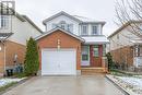 View of property featuring a garage - 39 Bridlewreath Street, Kitchener, ON  - Outdoor 