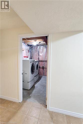 Laundry room in the basement - 39 Bridlewreath Street, Kitchener, ON - Indoor Photo Showing Laundry Room