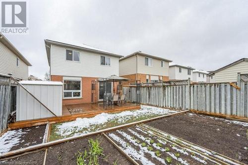 storage shed and a wooden deck - 39 Bridlewreath Street, Kitchener, ON - Outdoor With Exterior