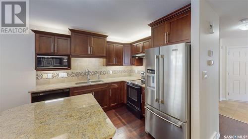 101 4100 Sandhill Crescent, Regina, SK - Indoor Photo Showing Kitchen