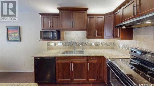 101 4100 Sandhill Crescent, Regina, SK - Indoor Photo Showing Kitchen With Upgraded Kitchen