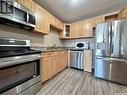 20 2620 5Th Avenue N, Regina, SK  - Indoor Photo Showing Kitchen With Stainless Steel Kitchen 