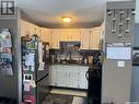 7158 Blakeney Drive, Regina, SK  - Indoor Photo Showing Kitchen With Double Sink 