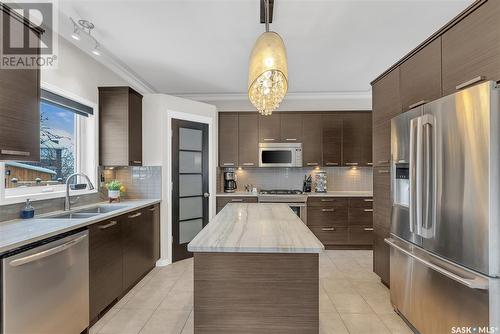 306 Wright Court, Saskatoon, SK - Indoor Photo Showing Kitchen With Double Sink With Upgraded Kitchen