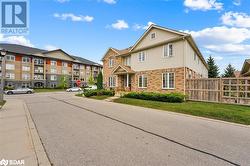 View of front facade featuring a front lawn - 