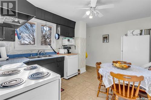 98 Trudelle Crescent, Regina, SK - Indoor Photo Showing Kitchen With Double Sink