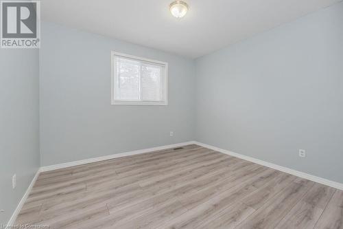 Unfurnished room with light wood-type flooring - 66 Karen Walk, Waterloo, ON - Indoor Photo Showing Other Room