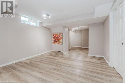 Basement with light hardwood / wood-style floors - 66 Karen Walk, Waterloo, ON - Indoor