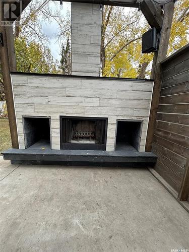 223 Sunset Drive, Regina, SK - Indoor With Fireplace